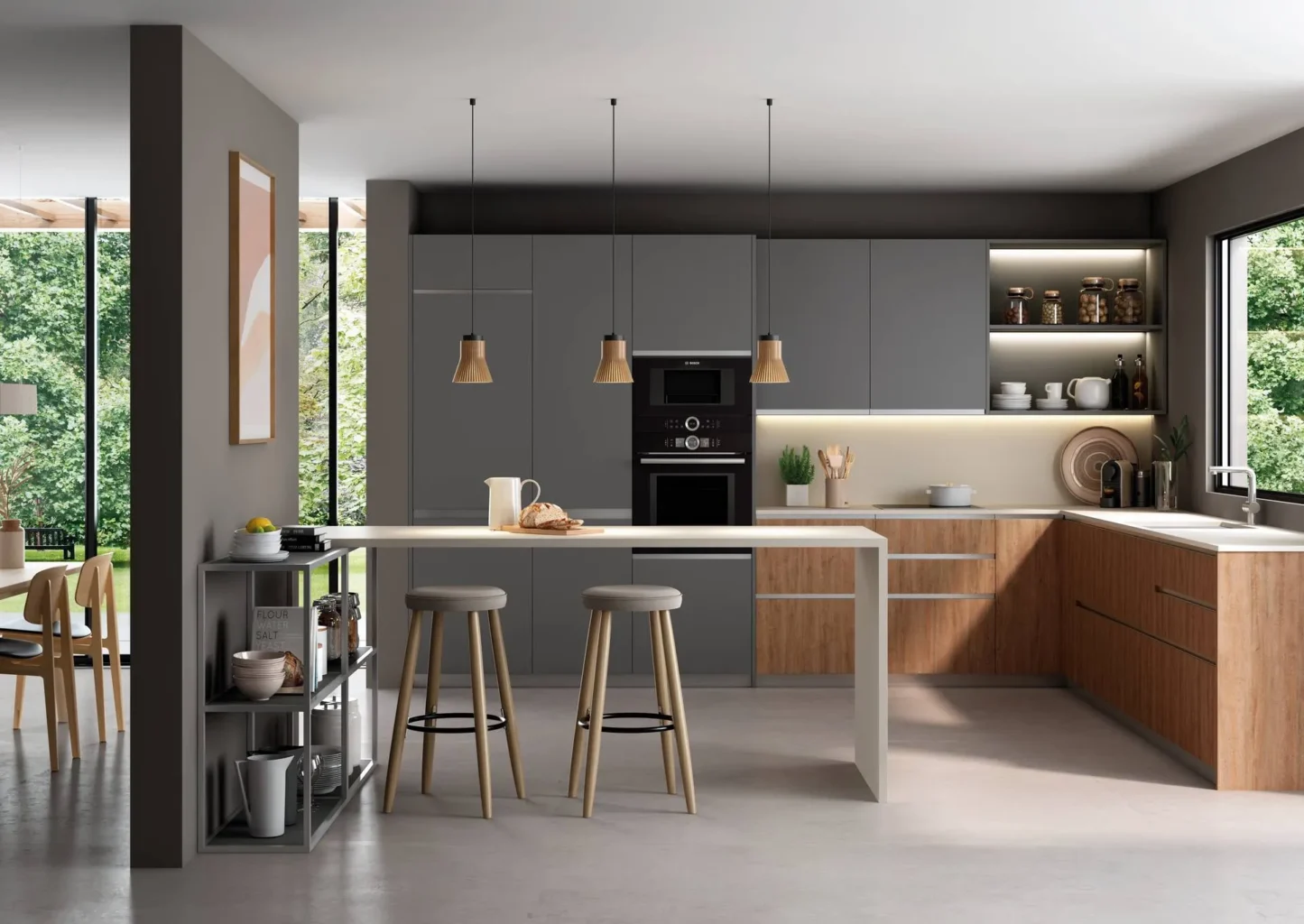 Cocina gris y madera en L con isla, barra con taburetes, horno y microondas Bosch, estanterías iluminadas y ventanales al jardín